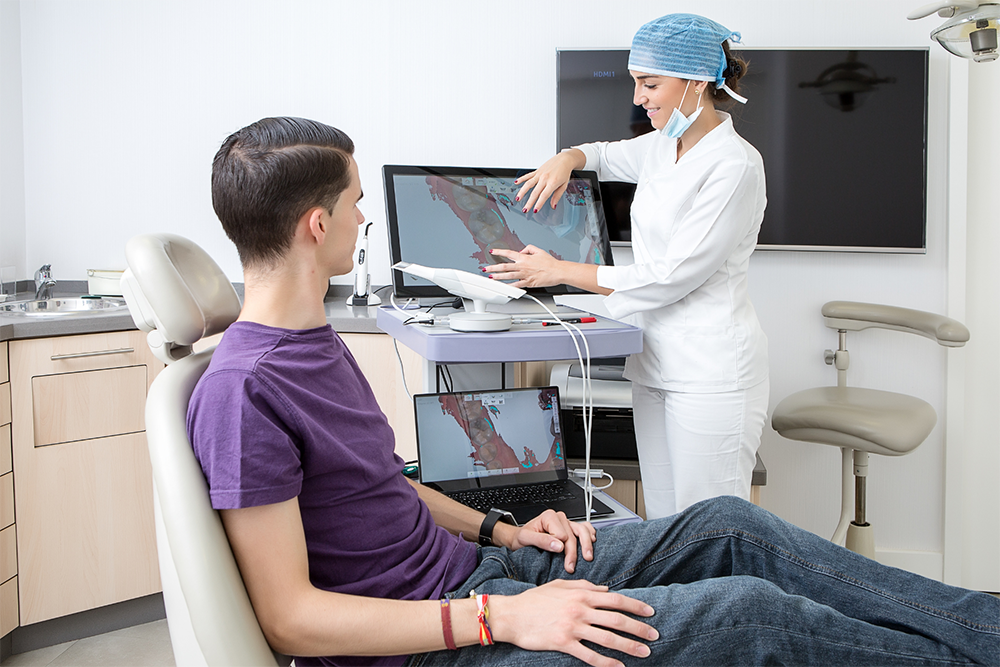 Orthodontic patient with assistant